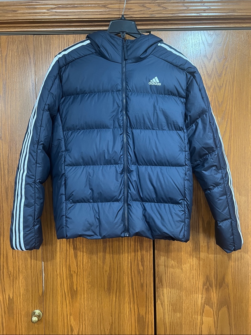Adidas blue midweight down hooded jacket.  IK3213.